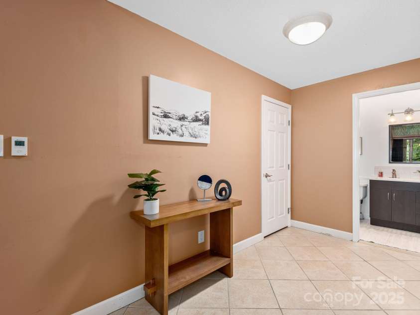 42 Hollybrook Drive, Asheville, NC 28803.  MLS# CAR4256176, YatesRealty ID 27329. Landing area perfect for additional storage