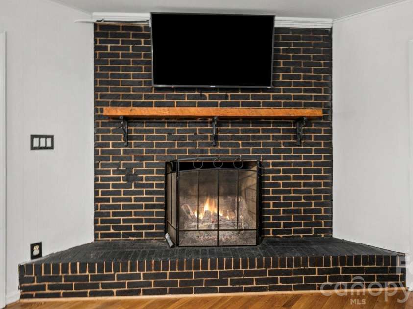 2106 Arden Drive, Monroe, NC 28112.  MLS# CAR4387611, YatesRealty ID 27335. Fireplace virtually enhanced