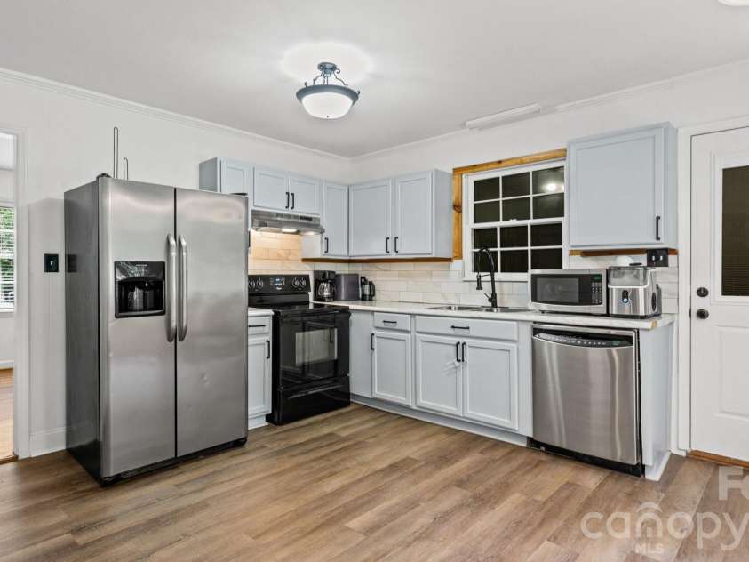 2106 Arden Drive, Monroe, NC 28112.  MLS# CAR4387611, YatesRealty ID 27335. Kitchen with new flooring