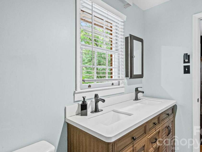 2106 Arden Drive, Monroe, NC 28112.  MLS# CAR4387611, YatesRealty ID 27335. Owners' 2nd floor bathroom