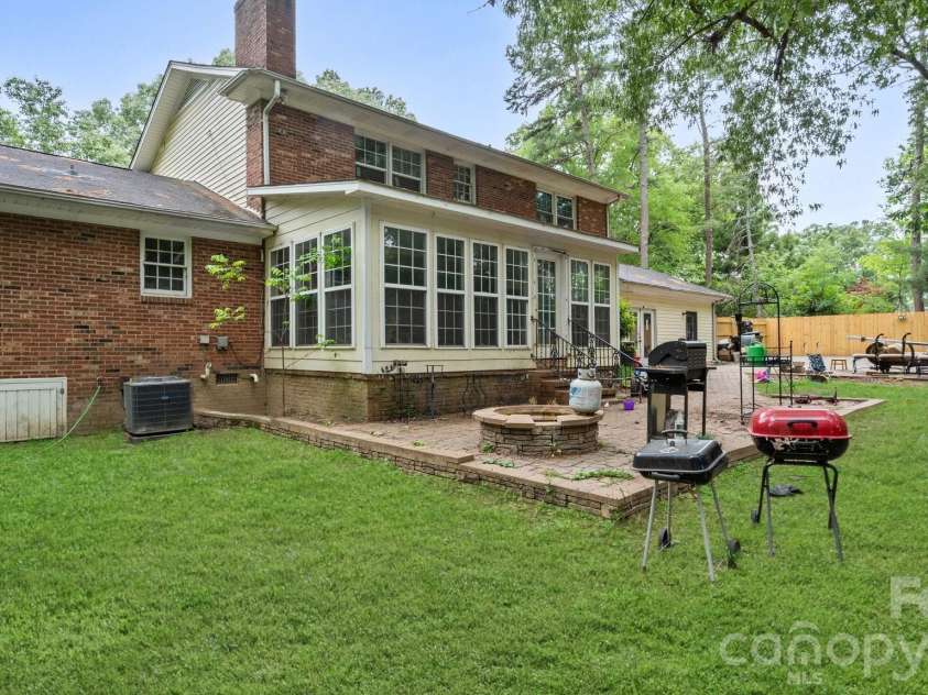 2106 Arden Drive, Monroe, NC 28112.  MLS# CAR4387611, YatesRealty ID 27335. Patio includes firepit
