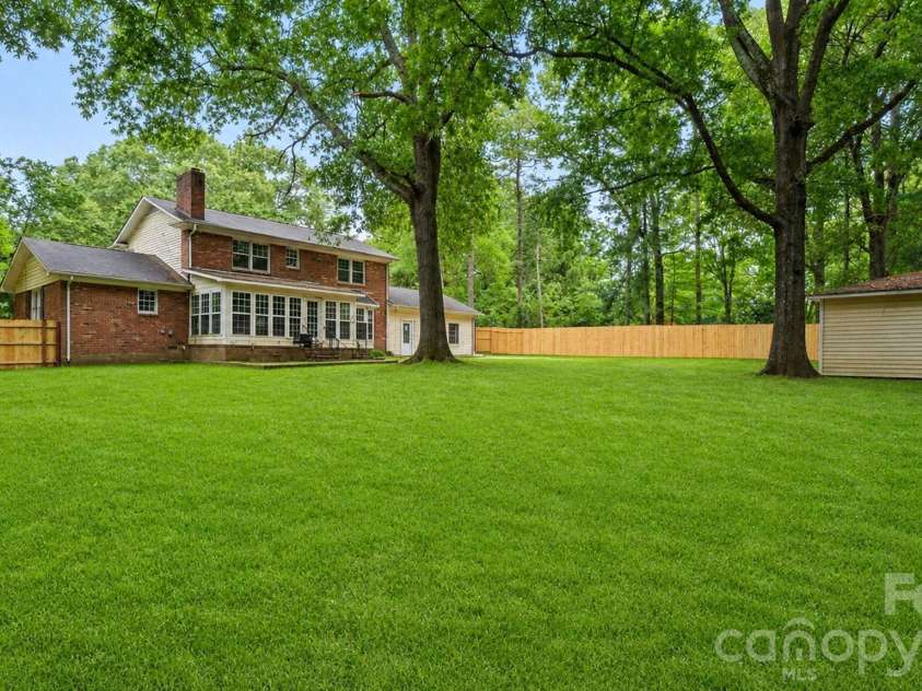 2106 Arden Drive, Monroe, NC 28112.  MLS# CAR4387611, YatesRealty ID 27335. View from back - virtually enhanced