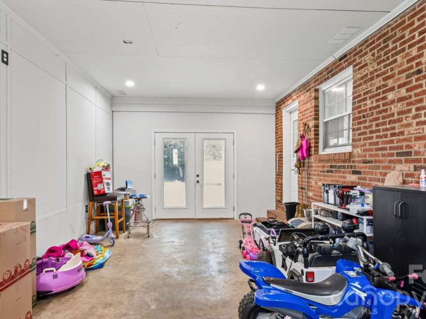 2106 Arden Drive, Monroe, NC 28112.  MLS# CAR4414733, YatesRealty ID 27335. Enclosed garage area