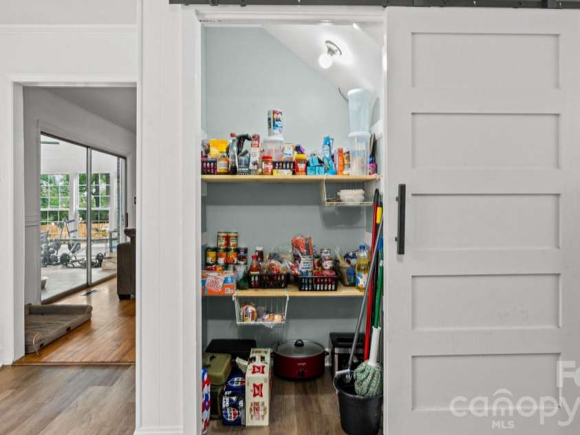 2106 Arden Drive, Monroe, NC 28112.  MLS# CAR4414733, YatesRealty ID 27335. Large pantry with sliding barn door