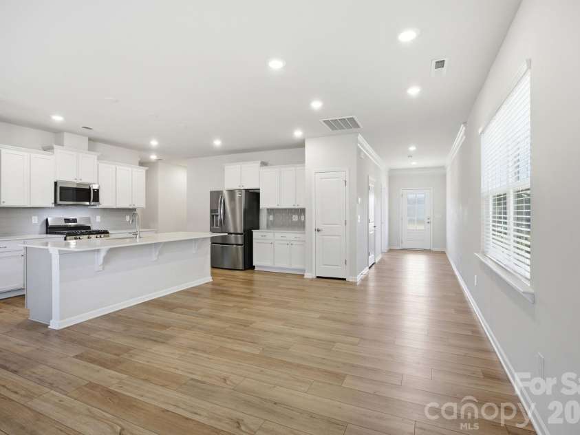 174 White Apple Way, Statesville, NC 28625.  MLS# CAR4383923, YatesRealty ID 27336. Large pantry in kitchen