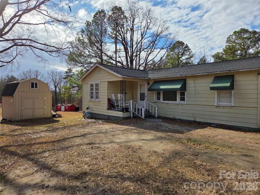 8334 Oaktree Road, Sharon, SC 29742.  MLS# CAR4344254, YatesRealty ID 2734. Front w/ shed
