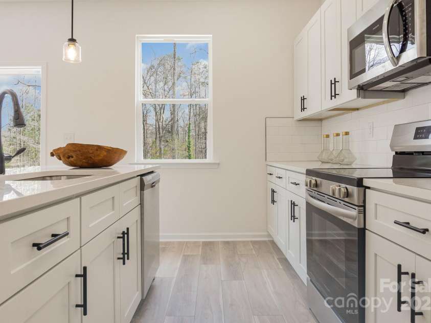 901 Cathey Road, Charlotte, NC 28214.  MLS# CAR4224939, YatesRealty ID 2734. Stainless Steel Appliances. Representative Photo
