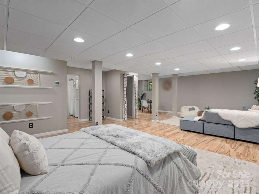 324 Woody Lane, Asheville, NC 28804.  MLS# CAR4235932, YatesRealty ID 27341. Extra living space in lower level with garage entrance