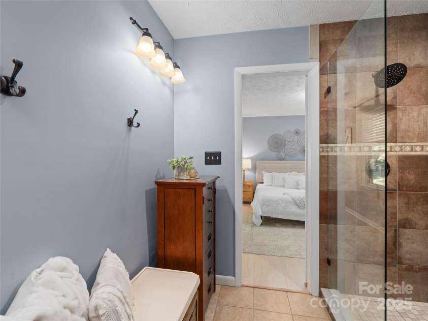 324 Woody Lane, Asheville, NC 28804.  MLS# CAR4235932, YatesRealty ID 27341. Master bath