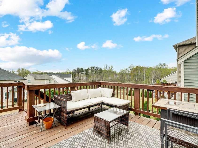 10161 Castlebrooke Drive, Concord, NC 28027.  MLS# CAR4242791, YatesRealty ID 27342. Main Level deck