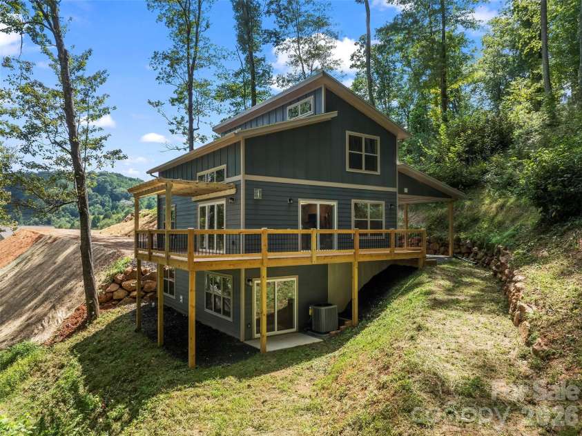 214 Aster Ridge Drive, Waynesville, NC 28786.  MLS# CAR4421869, YatesRealty ID 27344. Back yard has space for fire pit
