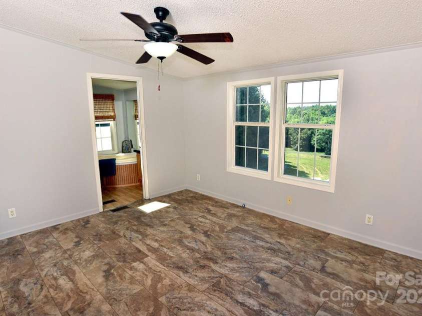 1924 Junction Road, Mocksville, NC 27028.  MLS# CAR4279453, YatesRealty ID 27346. Primary Bedroom