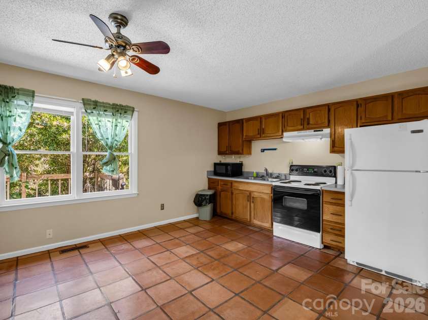 255 & 257 Crescent Street, Saluda, NC 28773.  MLS# CAR4383610, YatesRealty ID 27346. Kitchen