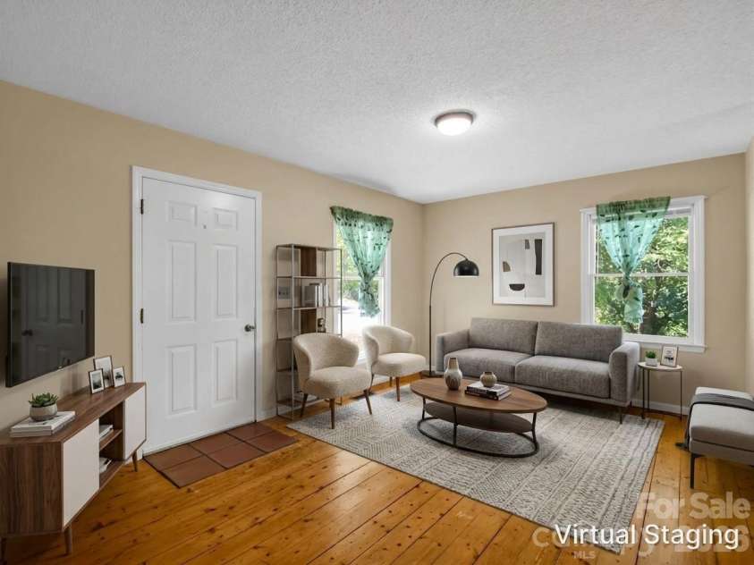 255 & 257 Crescent Street, Saluda, NC 28773.  MLS# CAR4383610, YatesRealty ID 27346. Living Room/Entry