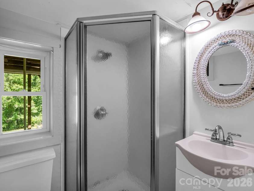 255 & 257 Crescent Street, Saluda, NC 28773.  MLS# CAR4383610, YatesRealty ID 27346. Primary Bath