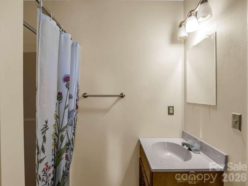 255 & 257 Crescent Street, Saluda, NC 28773.  MLS# CAR4383610, YatesRealty ID 27346. Primary Bath