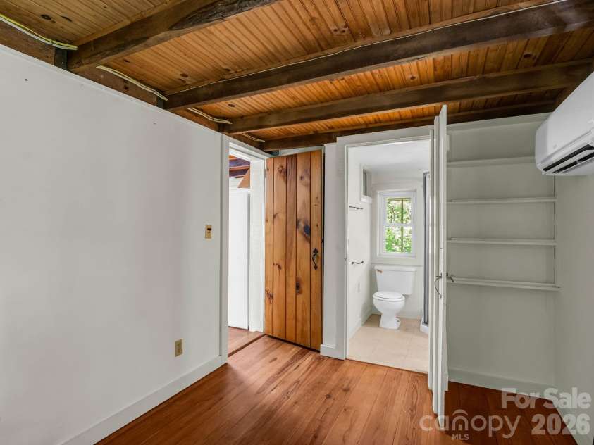 255 & 257 Crescent Street, Saluda, NC 28773.  MLS# CAR4383610, YatesRealty ID 27346. Primary Bedroom