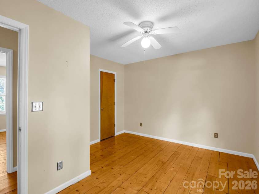 255 & 257 Crescent Street, Saluda, NC 28773.  MLS# CAR4383610, YatesRealty ID 27346. Primary Bedroom