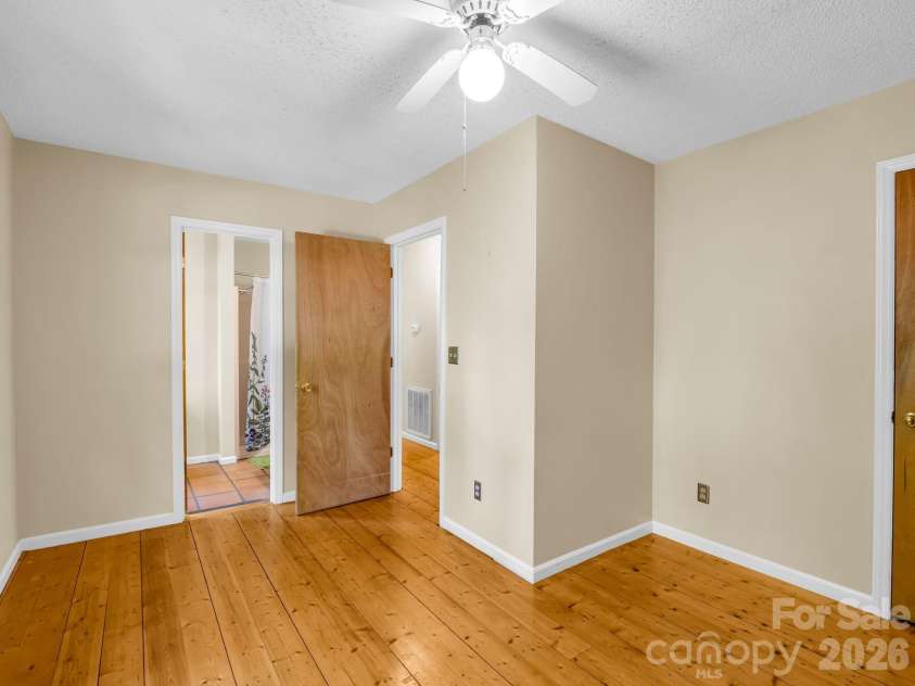255 & 257 Crescent Street, Saluda, NC 28773.  MLS# CAR4383610, YatesRealty ID 27346. Primary Bedroom