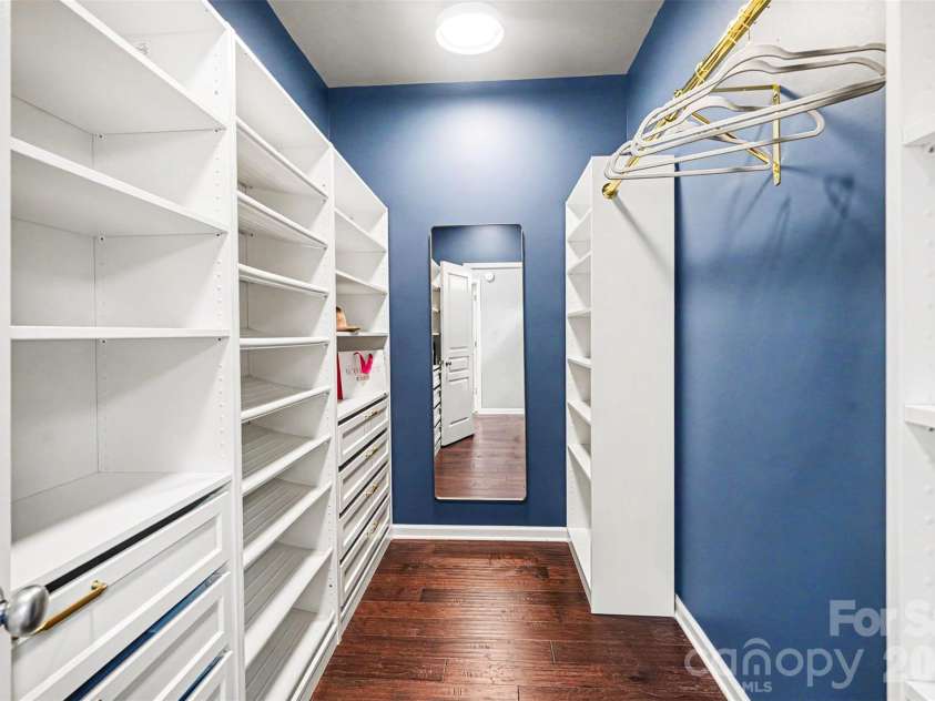 1145 Hammond Drive, Matthews, NC 28104.  MLS# CAR4386704, YatesRealty ID 27349. Custom primary closet