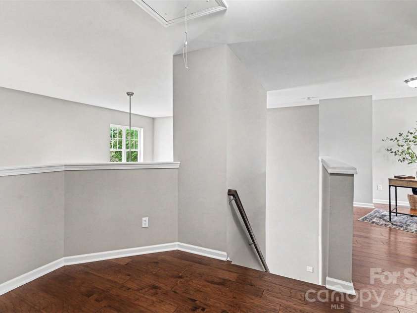 1145 Hammond Drive, Matthews, NC 28104.  MLS# CAR4386704, YatesRealty ID 27349. Loft 