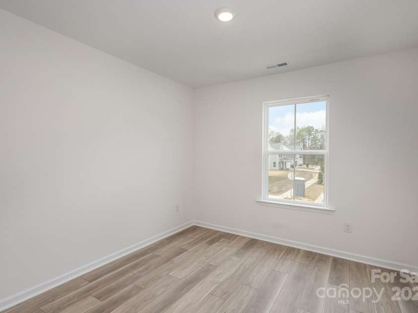 2016 Sadler Woods Lane, Charlotte, NC 28214.  MLS# CAR4220744, YatesRealty ID 2735. Bedroom 3. Representative Photo