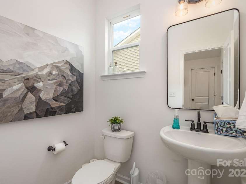 2016 Sadler Woods Lane, Charlotte, NC 28214.  MLS# CAR4220744, YatesRealty ID 2735. Half Bath. Representative Photo