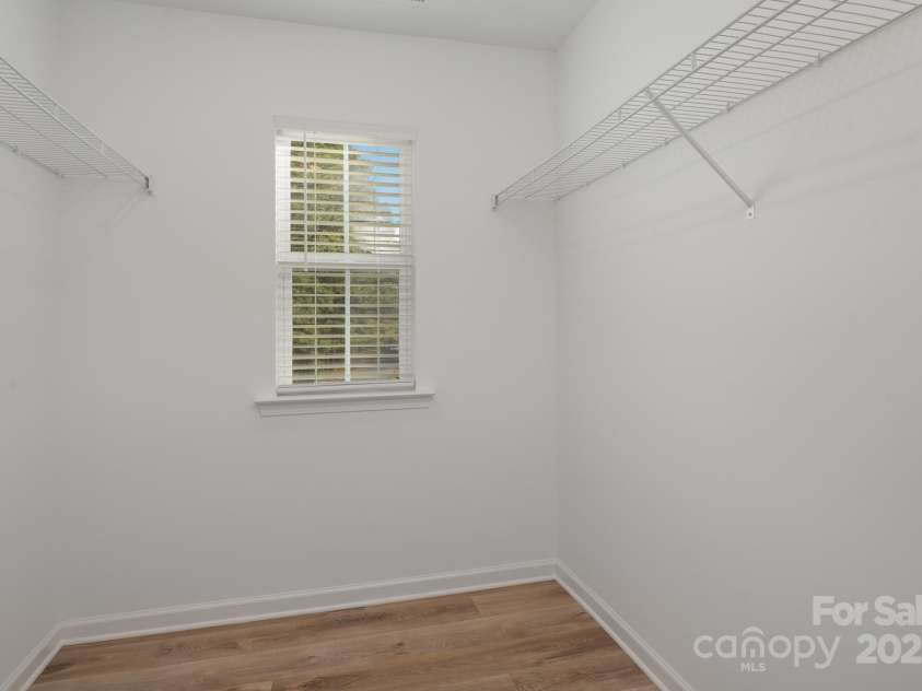 2016 Sadler Woods Lane, Charlotte, NC 28214.  MLS# CAR4220744, YatesRealty ID 2735. Walk-in closet. Representative Photo