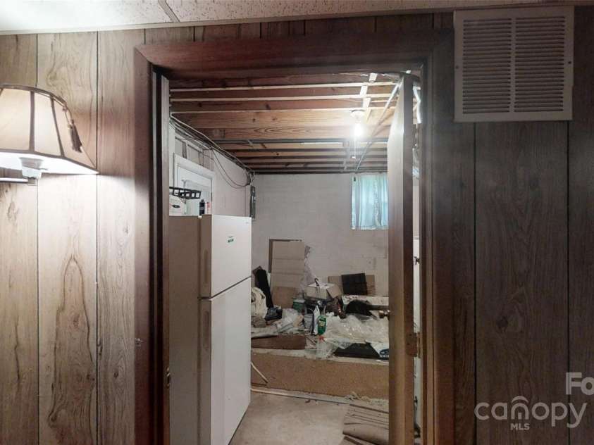 5 Auburndale Drive, Asheville, NC 28806.  MLS# CAR4274800, YatesRealty ID 27351. Furnace/storage entrance from family room