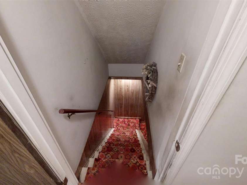 5 Auburndale Drive, Asheville, NC 28806.  MLS# CAR4274800, YatesRealty ID 27351. Stairs going downstairs