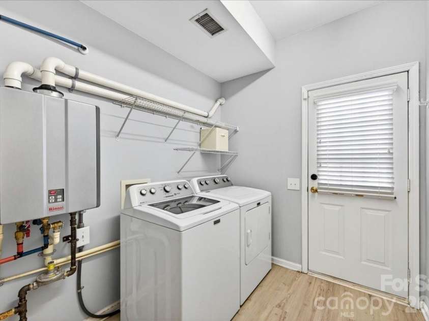 5426 Dockery Drive, Charlotte, NC 28209.  MLS# CAR4384151, YatesRealty ID 27353. Lower level laundry