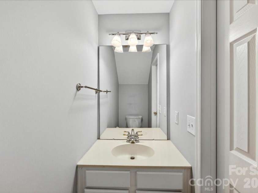 5426 Dockery Drive, Charlotte, NC 28209.  MLS# CAR4384151, YatesRealty ID 27353. Lower level powder room