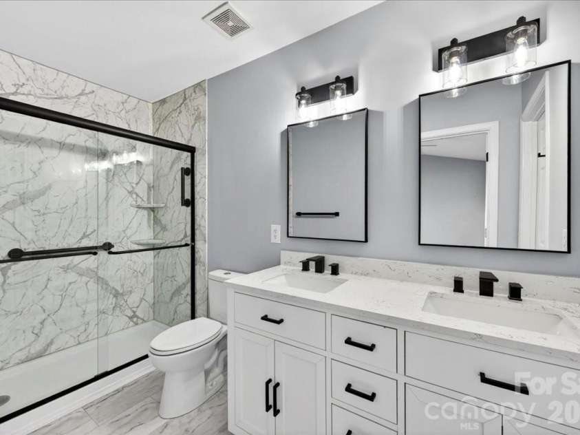 5426 Dockery Drive, Charlotte, NC 28209.  MLS# CAR4384151, YatesRealty ID 27353. Updated primary bath