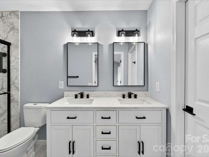 5426 Dockery Drive, Charlotte, NC 28209.  MLS# CAR4384151, YatesRealty ID 27353. Updated primary bath
