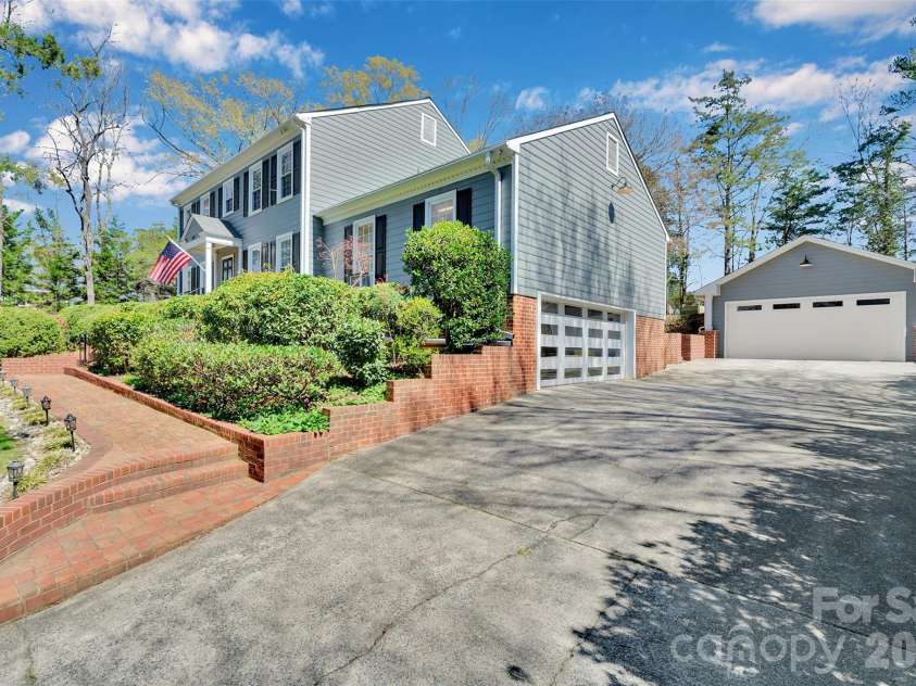 421 Sardis Lane, Charlotte, NC 28270.  MLS# CAR4363122, YatesRealty ID 27355. More garage, parking and storage space than you could imagine!
