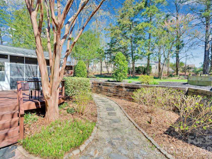 421 Sardis Lane, Charlotte, NC 28270.  MLS# CAR4363122, YatesRealty ID 27355. Stunning gardens meticulously maintained