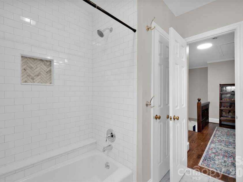 421 Sardis Lane, Charlotte, NC 28270.  MLS# CAR4363122, YatesRealty ID 27355. Updated hall bathroom