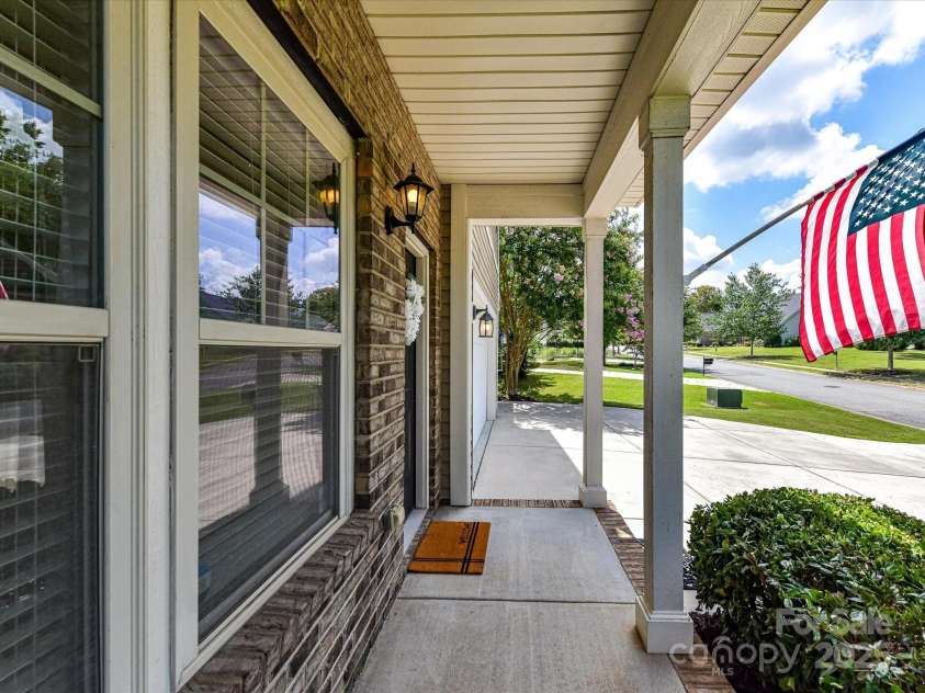 2420 Sierra Chase Drive, Monroe, NC 28112.  MLS# CAR4281740, YatesRealty ID 27356. Covered front porch