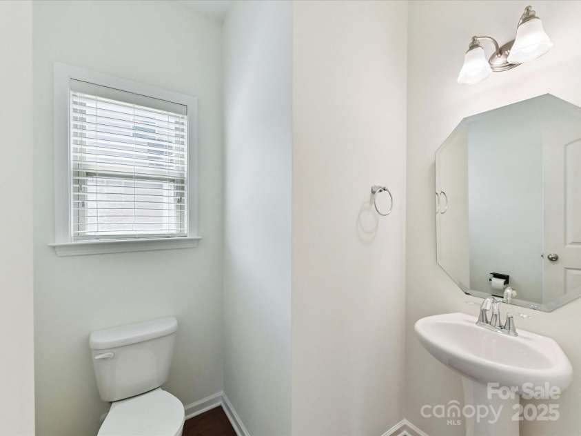 2420 Sierra Chase Drive, Monroe, NC 28112.  MLS# CAR4281740, YatesRealty ID 27356. Main level powder room