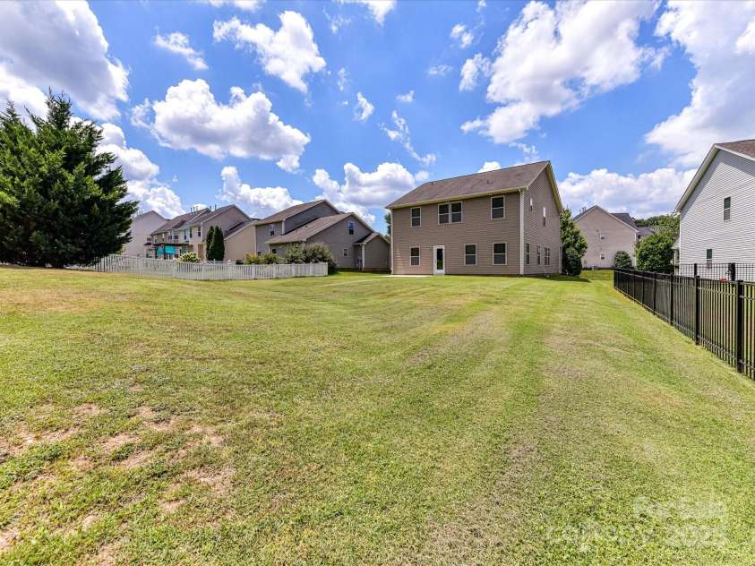 2420 Sierra Chase Drive, Monroe, NC 28112.  MLS# CAR4281740, YatesRealty ID 27356. Nice flat backyard