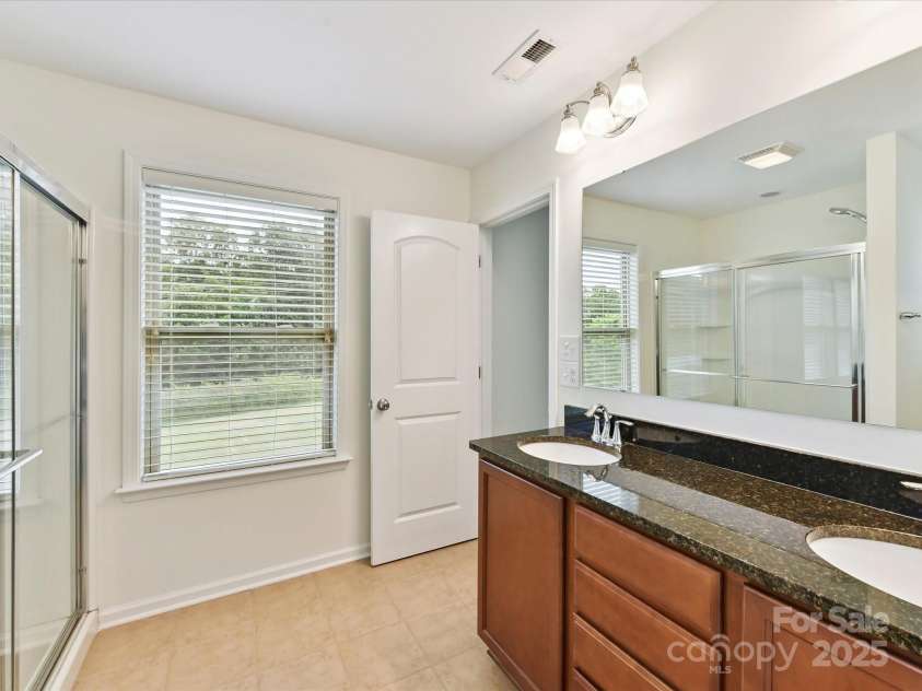 2420 Sierra Chase Drive, Monroe, NC 28112.  MLS# CAR4281740, YatesRealty ID 27356. Primary Bath