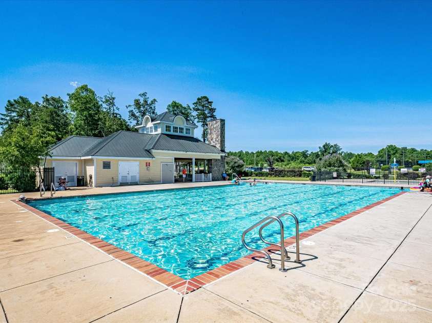 2420 Sierra Chase Drive, Monroe, NC 28112.  MLS# CAR4281740, YatesRealty ID 27356. Stonebridge pool