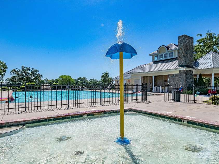 2420 Sierra Chase Drive, Monroe, NC 28112.  MLS# CAR4281740, YatesRealty ID 27356. Stonebridge pool