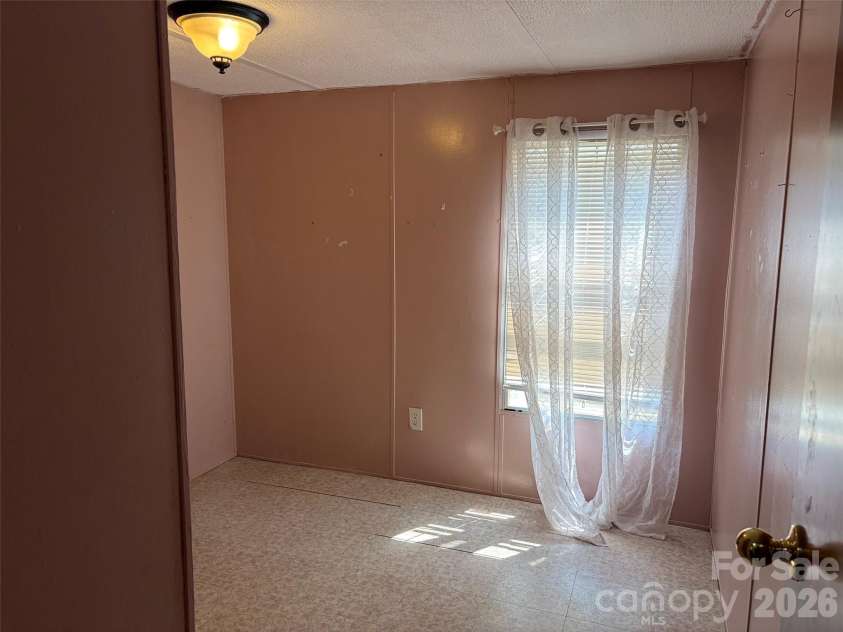 15 spring Street, Candler, NC 28715.  MLS# CAR4384784, YatesRealty ID 27357. 2nd bedroom