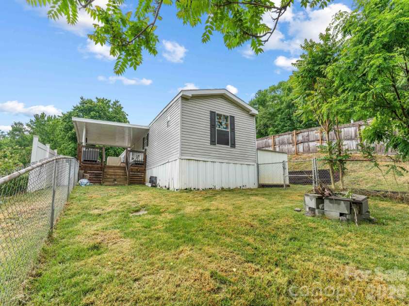 15 spring Street, Candler, NC 28715.  MLS# CAR4384784, YatesRealty ID 27357. Back Fenced in yard