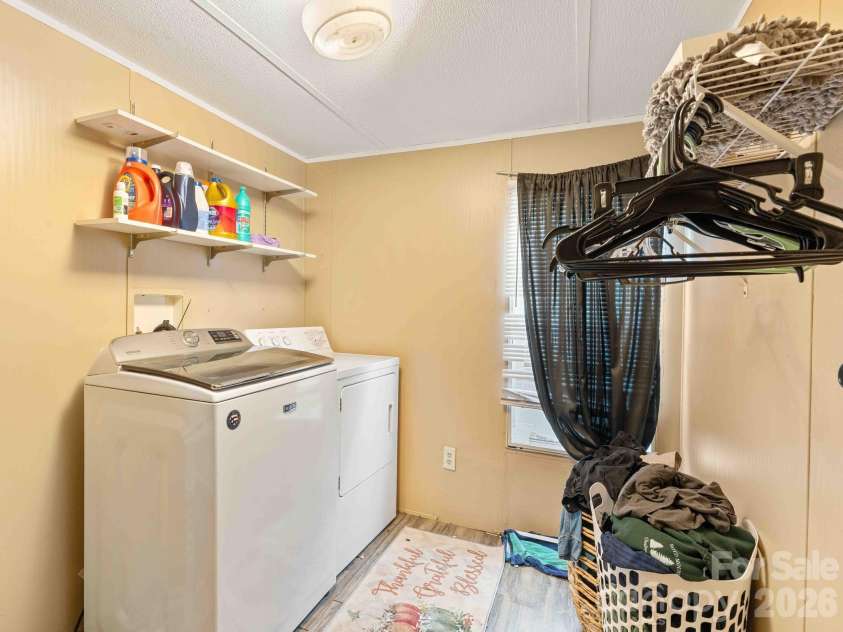15 spring Street, Candler, NC 28715.  MLS# CAR4384784, YatesRealty ID 27357. Laundry Area