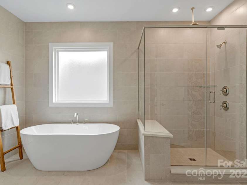 11023 Kilkenny Drive, Charlotte, NC 28277.  MLS# CAR4278012, YatesRealty ID 27359. Soaking Tub and Standing Shower