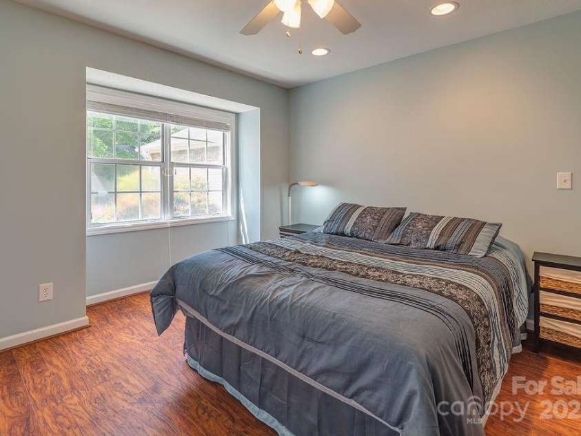 100 Thistle Knoll Court, Asheville, NC 28803.  MLS# CAR4278085, YatesRealty ID 27367. Main level guest suite - jack + jill with hall bath