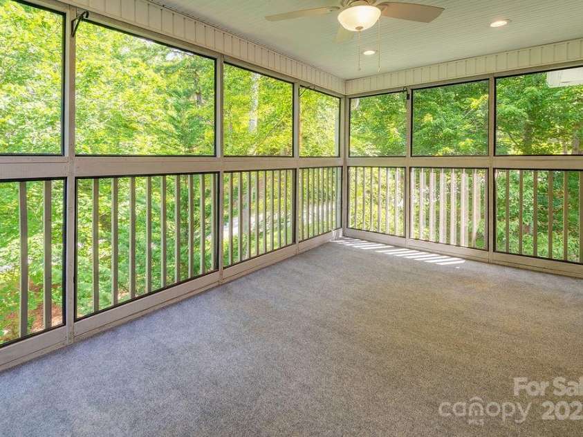 100 Thistle Knoll Court, Asheville, NC 28803.  MLS# CAR4278085, YatesRealty ID 27367. Main level screened in porch