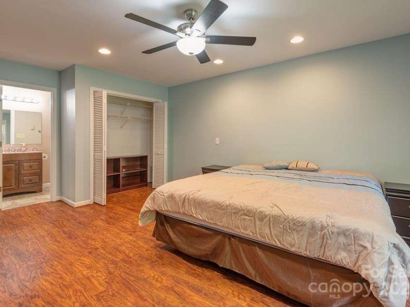 100 Thistle Knoll Court, Asheville, NC 28803.  MLS# CAR4278085, YatesRealty ID 27367. Spacious closet and attached en-suite